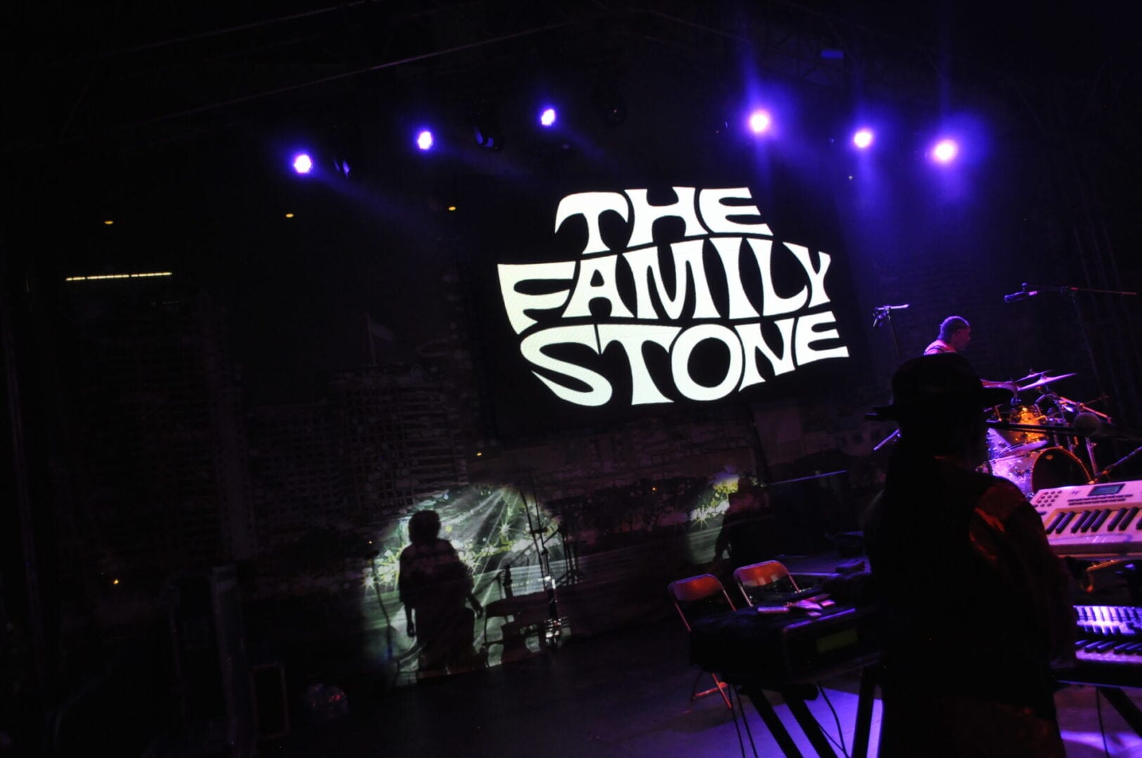 A stage with the words " the family stone ".