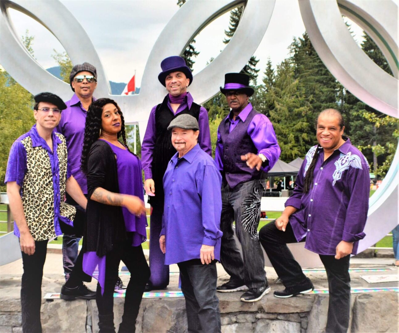 The Family Stone band in purple outfits
